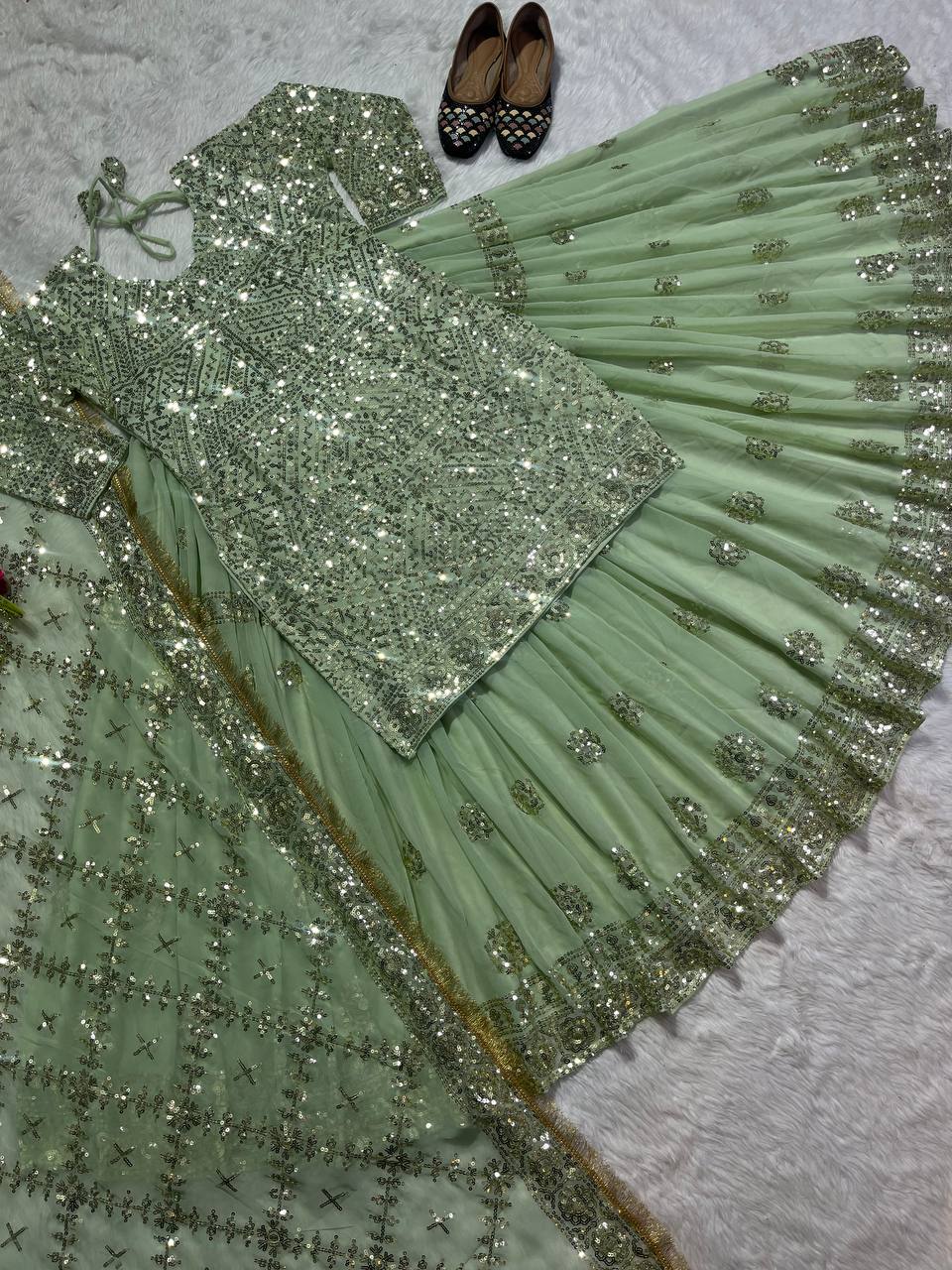 Beautiful Party Wear Top Lehenga With Fancy Border Work