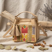 Nora Vegan Leather Embroidered Sling Bag – Almond