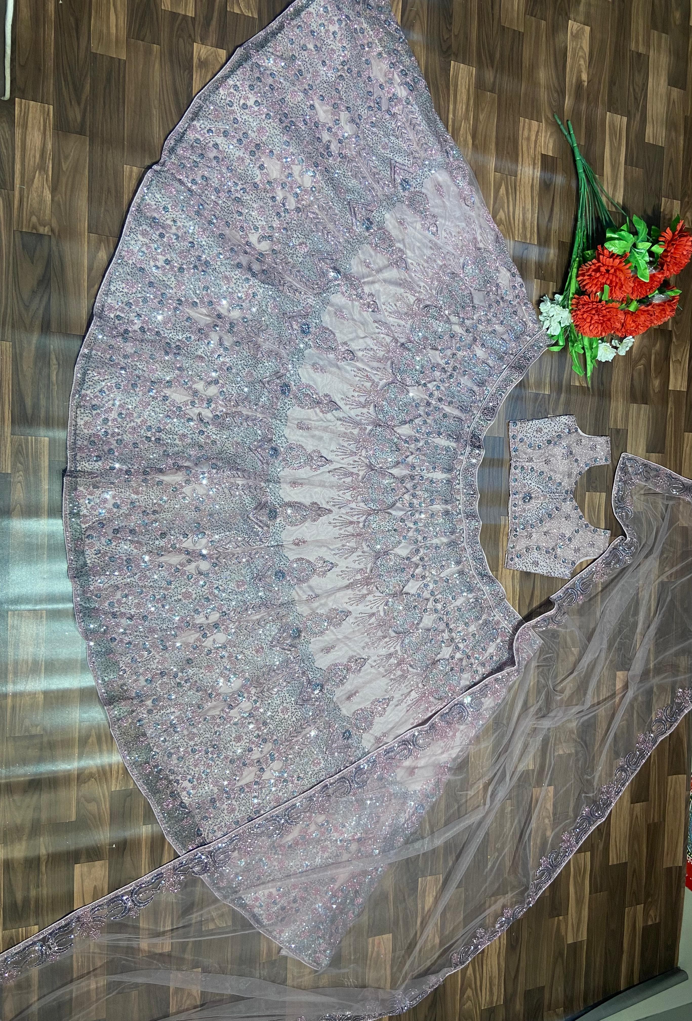 Party Wear Lehenga Choli With Beautiful Glitter Dori And Sequence Work